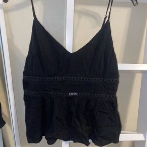 francesca’s black cropped tank top, US size large.